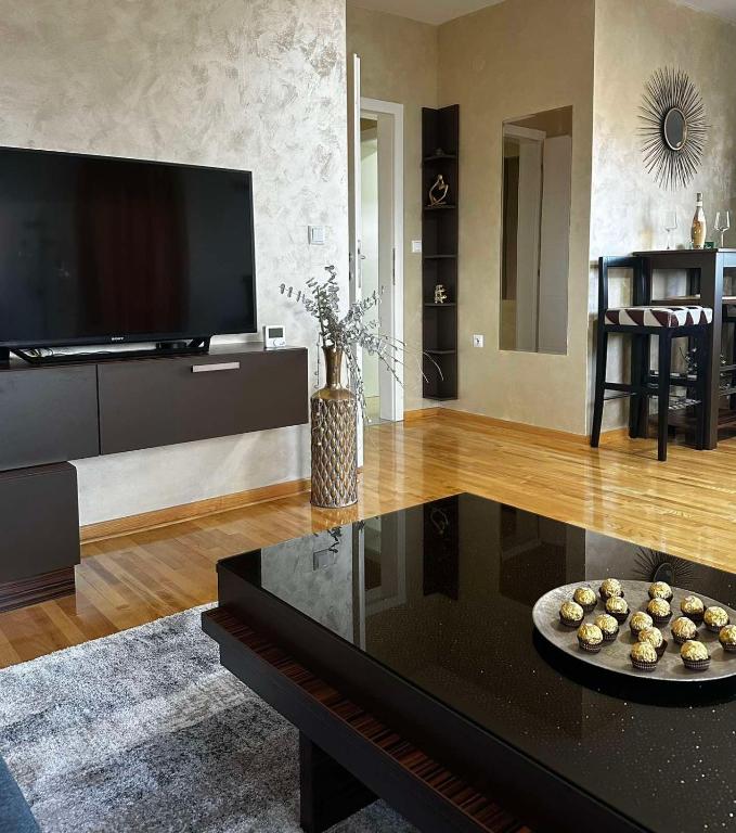 TV a/nebo společenská místnost v ubytování L&D apartman
