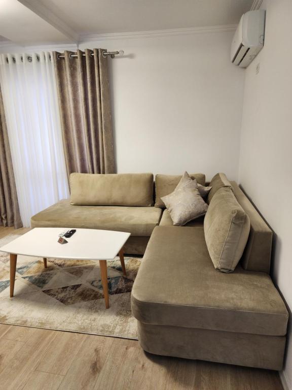 Posezení v ubytování Comfy Elbasan Apartment