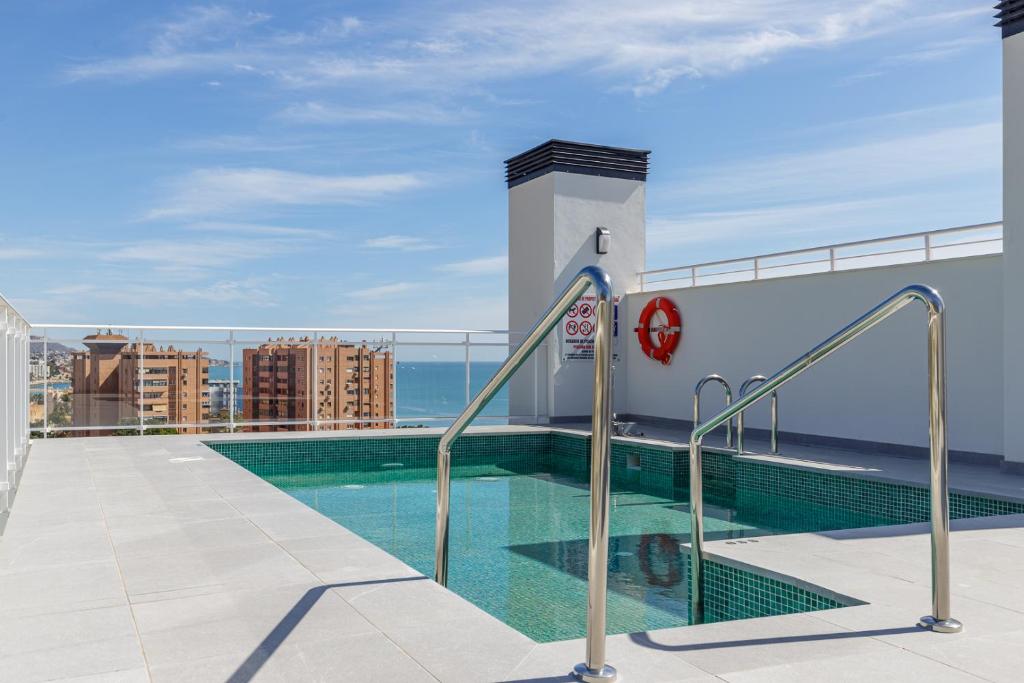 Swimmingpoolen hos eller tæt på Malagueta Miramar with Shared Pool by Caleta Homes