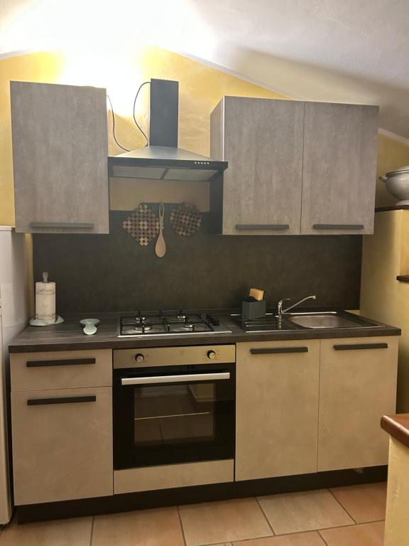 Kuchyň nebo kuchyňský kout v ubytování La Perla di Assisi