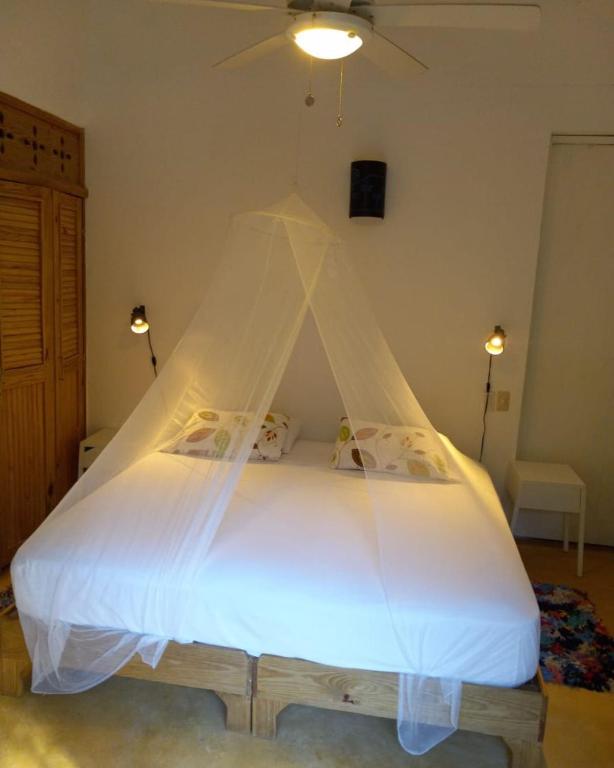 Cama o camas de una habitación en Clave Verde Ecolodge
