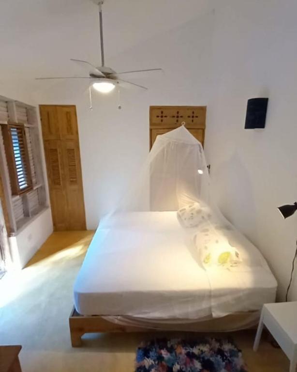 Cama o camas de una habitación en Clave Verde Ecolodge