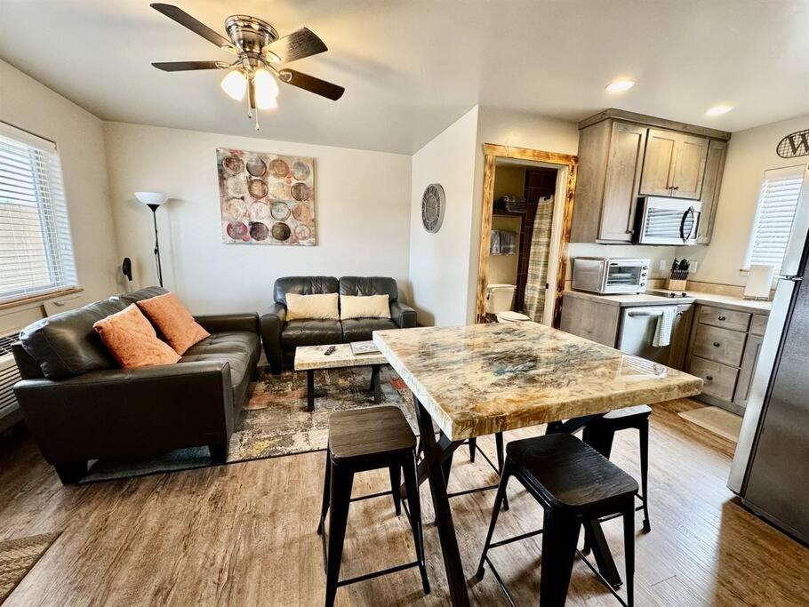 a living room with a couch and a table at Angel Rock Rentals of Moab Unit 2 in Moab