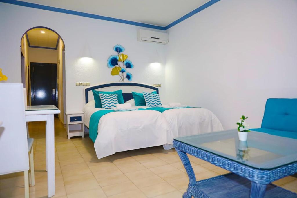 Postel nebo postele na pokoji v ubytování Hotel Marazul
