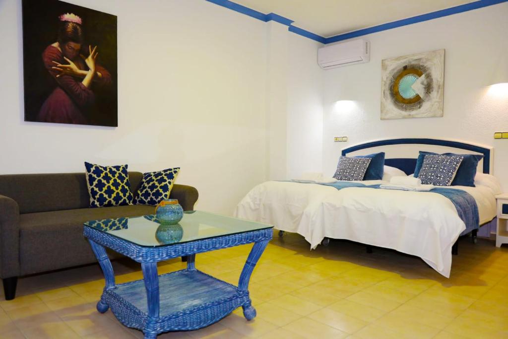 Postel nebo postele na pokoji v ubytování Hotel Marazul