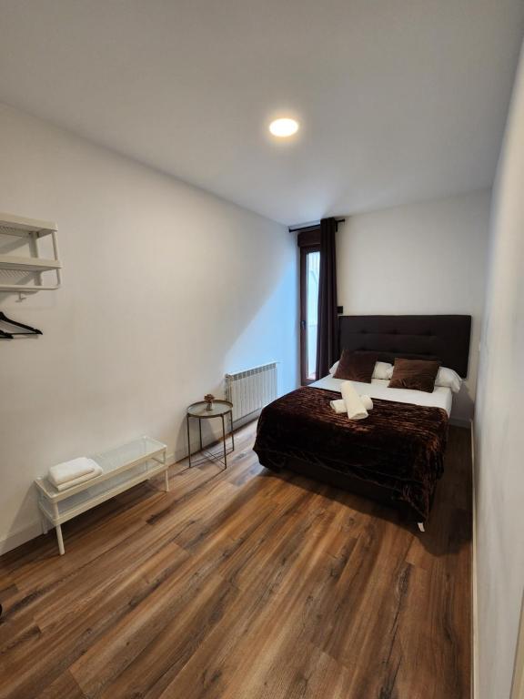 Postel nebo postele na pokoji v ubytování Hostal Arenal Madrid