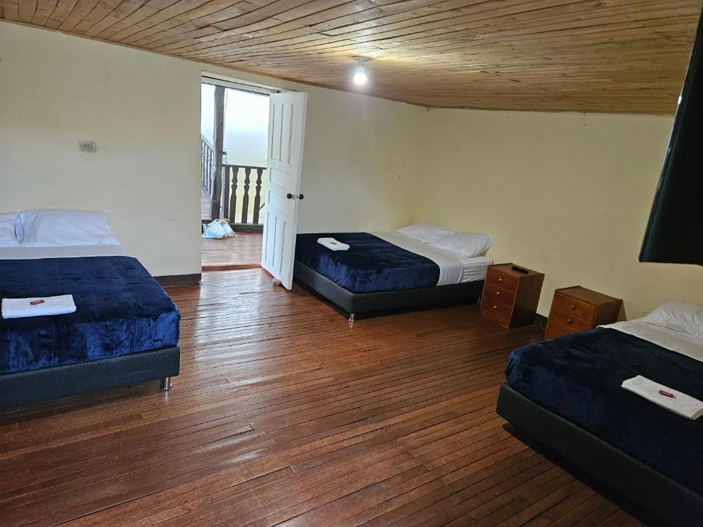 Tempat tidur dalam kamar di Casa Guicán