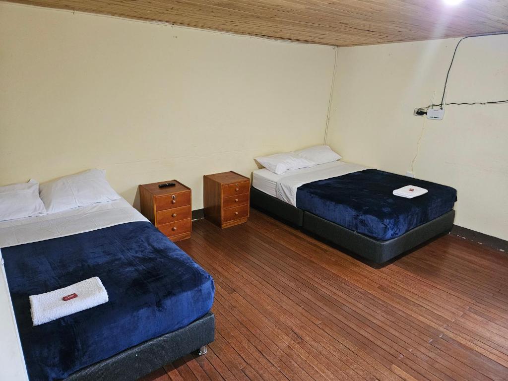Tempat tidur dalam kamar di Casa Guicán