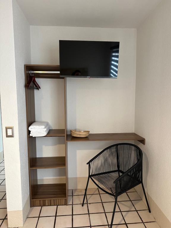 TV a/nebo společenská místnost v ubytování Casa de Maria