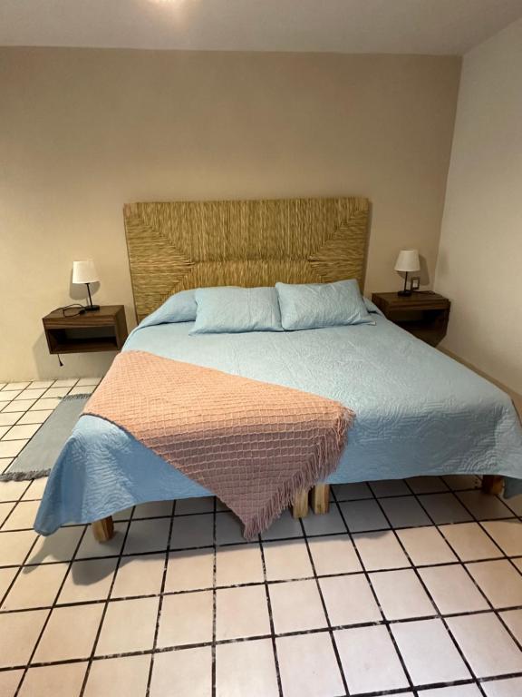 Postel nebo postele na pokoji v ubytování Casa de Maria