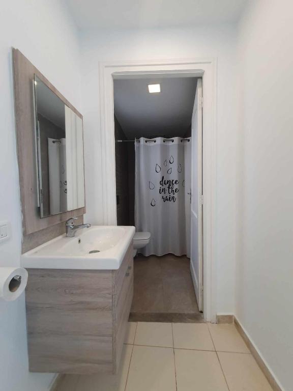 Koupelna v ubytování YoYo House