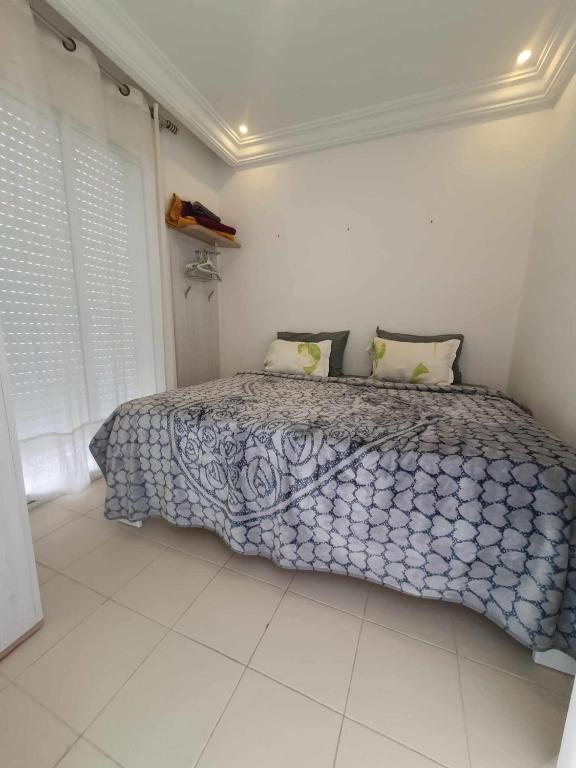 Postel nebo postele na pokoji v ubytování YoYo House