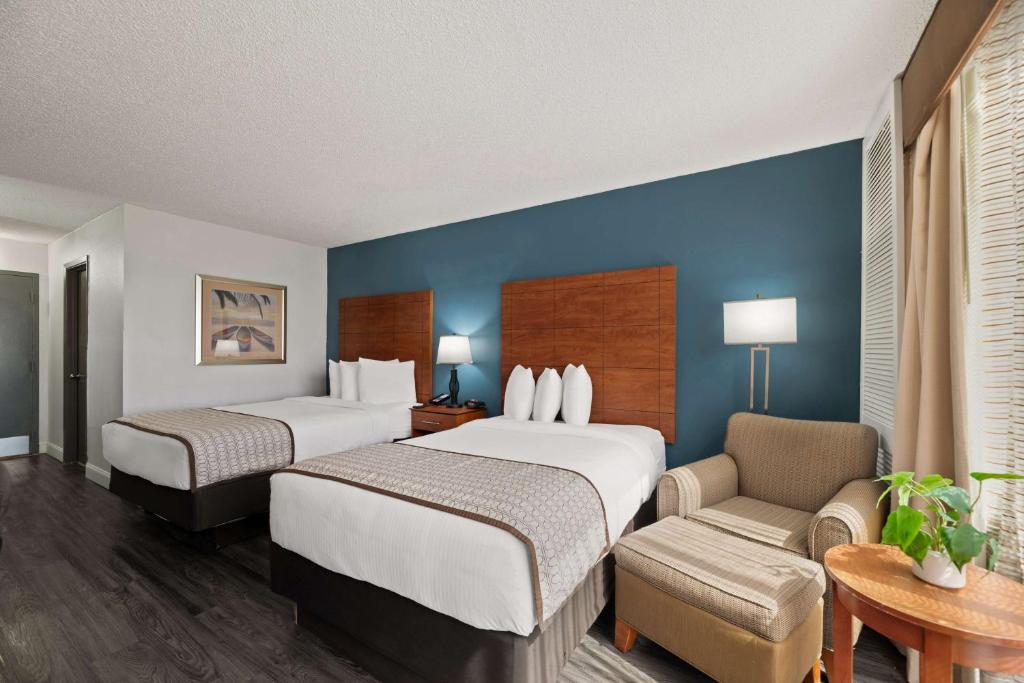 Postel nebo postele na pokoji v ubytování Best Western Orlando Gateway Hotel