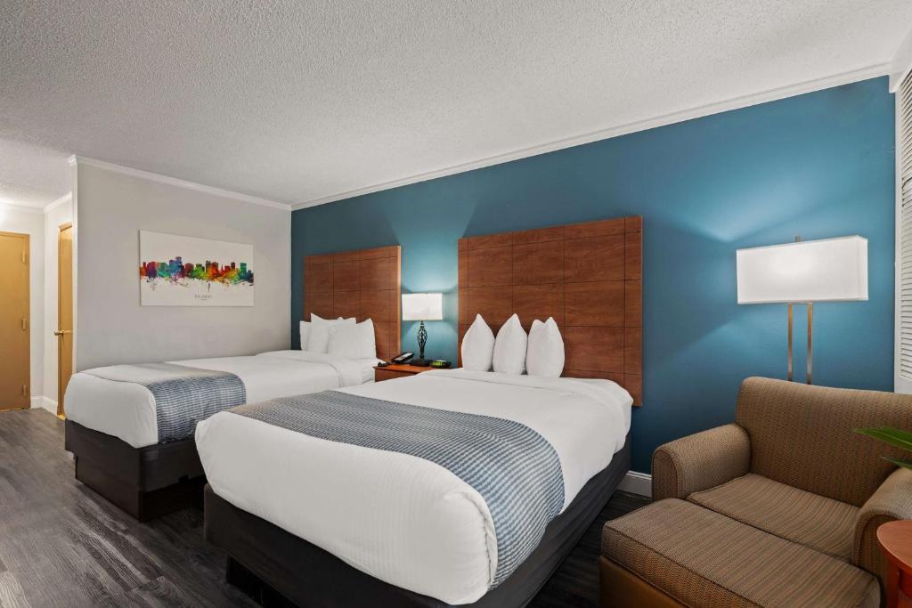 Postel nebo postele na pokoji v ubytování Best Western Orlando Gateway Hotel