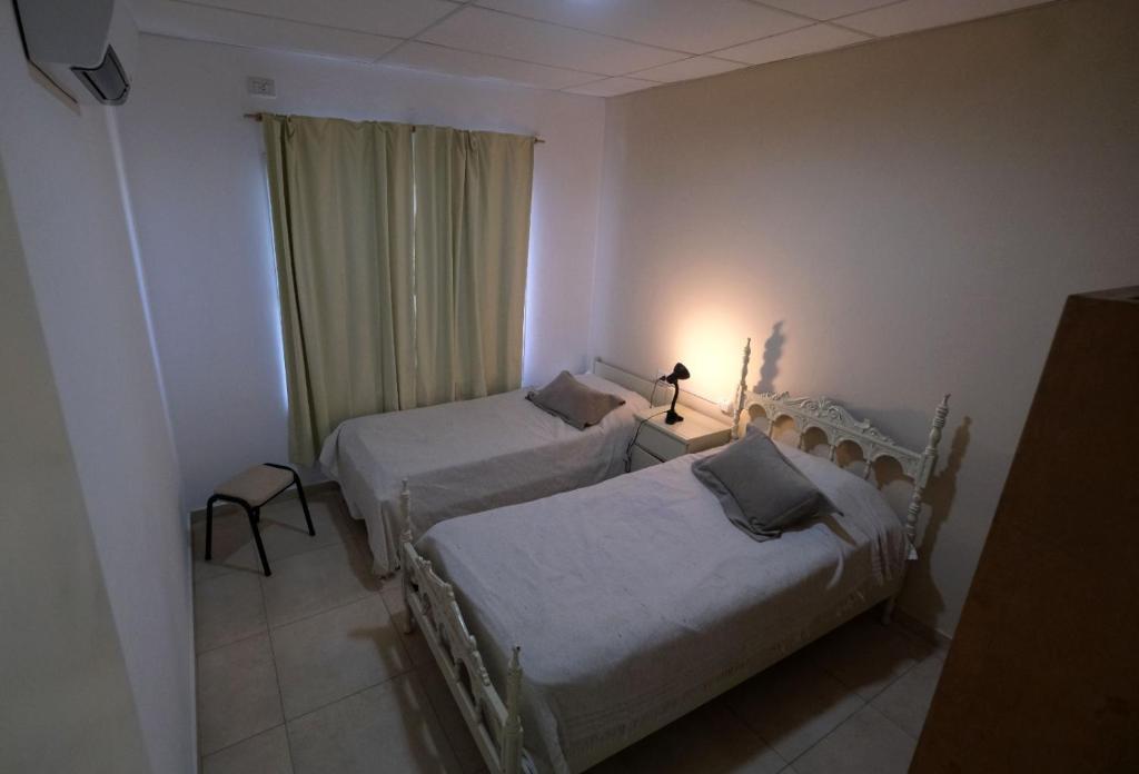 Postel nebo postele na pokoji v ubytování Amor de Finca