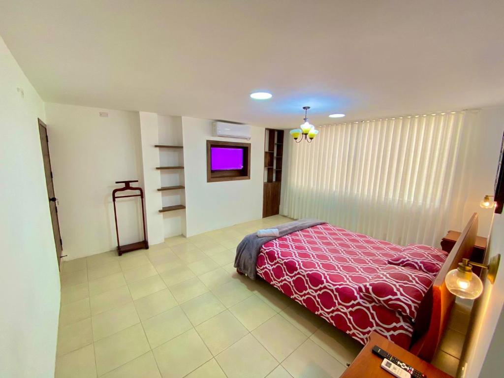 Postel nebo postele na pokoji v ubytování Hostal Marle