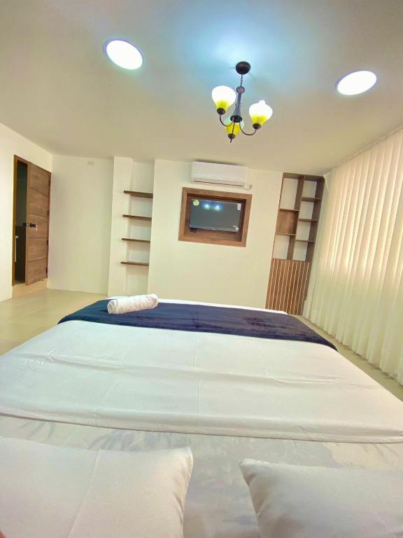 Postel nebo postele na pokoji v ubytování Hostal Marle