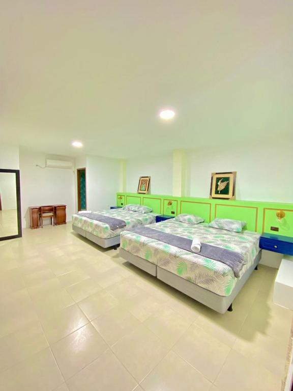 Postel nebo postele na pokoji v ubytování Hostal Marle