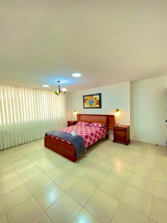 Postel nebo postele na pokoji v ubytování Hostal Marle