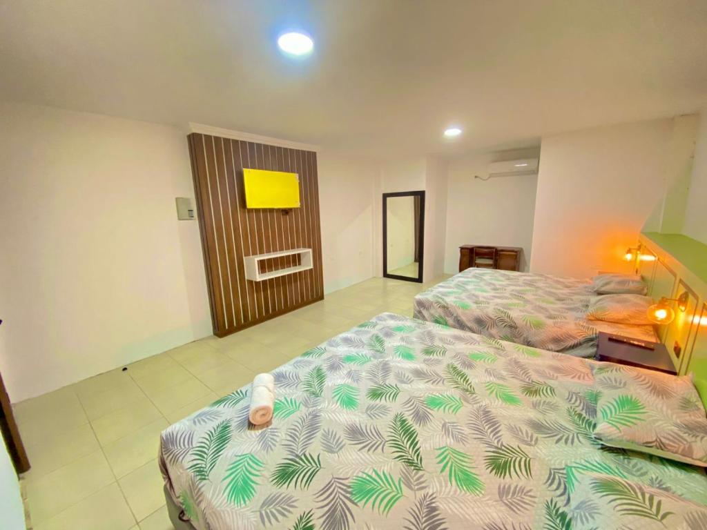 Postel nebo postele na pokoji v ubytování Hostal Marle
