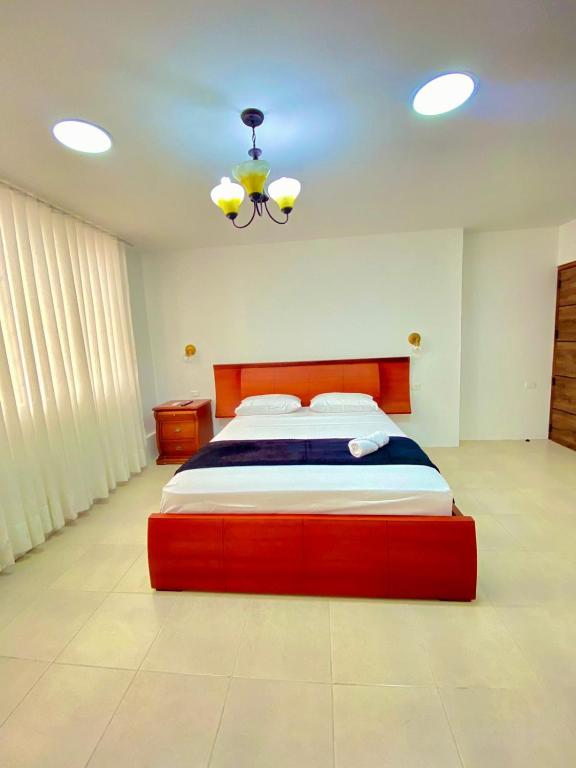 Postel nebo postele na pokoji v ubytování Hostal Marle