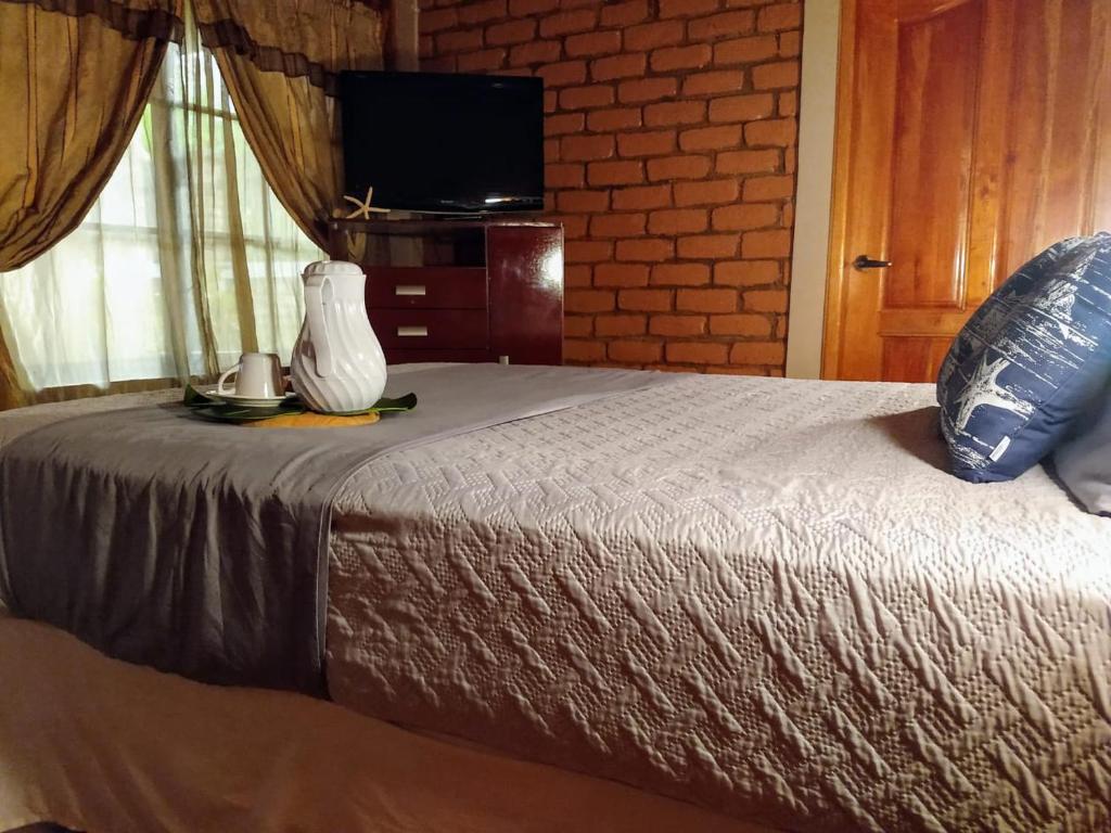 Postel nebo postele na pokoji v ubytování Eventos y villas Terra Bella