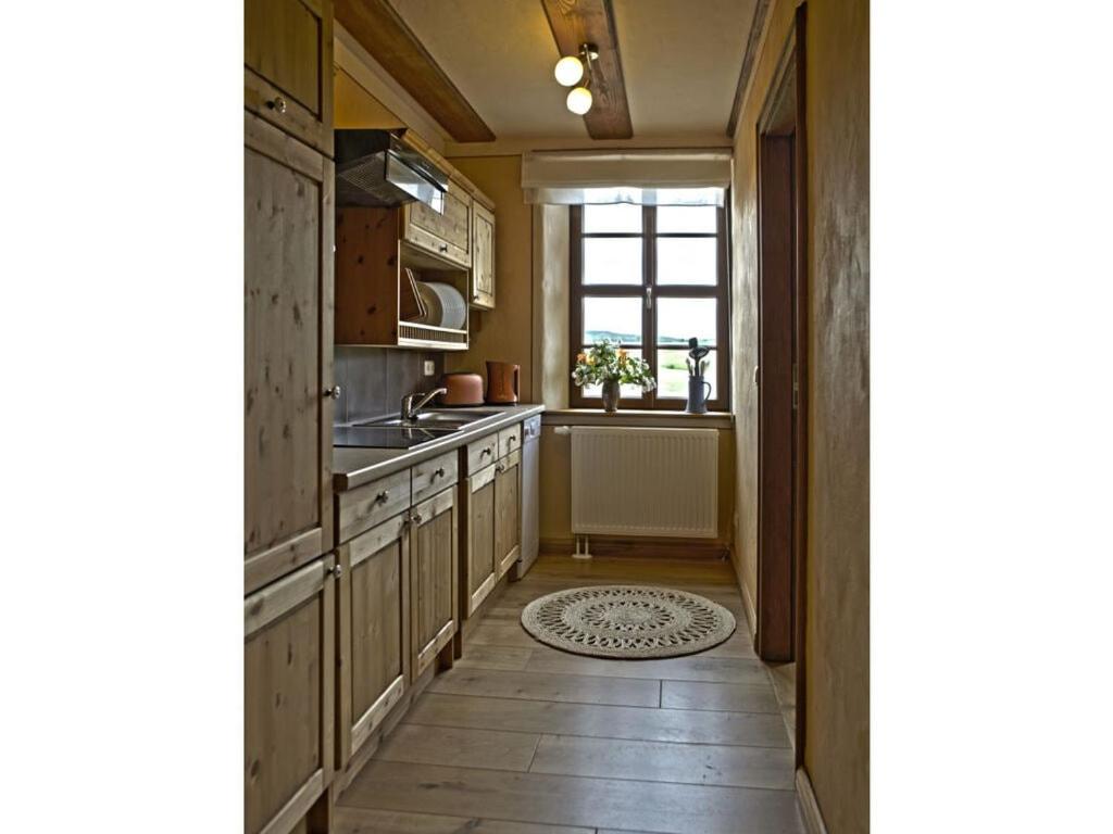 a kitchen with a sink and a window at Inviting apartment in Zell in Oppurg