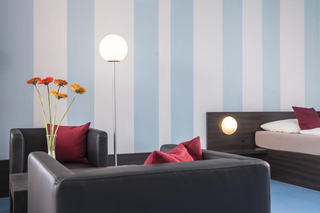 Postel nebo postele na pokoji v ubytování Hotel Grenzfall