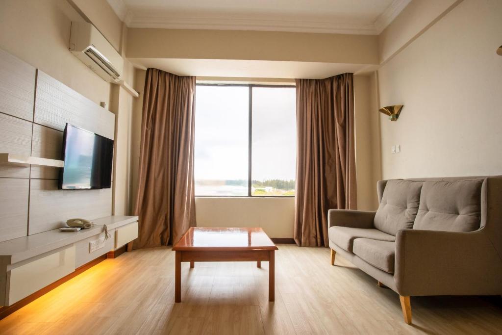 TV a/nebo společenská místnost v ubytování Somerset Hotel