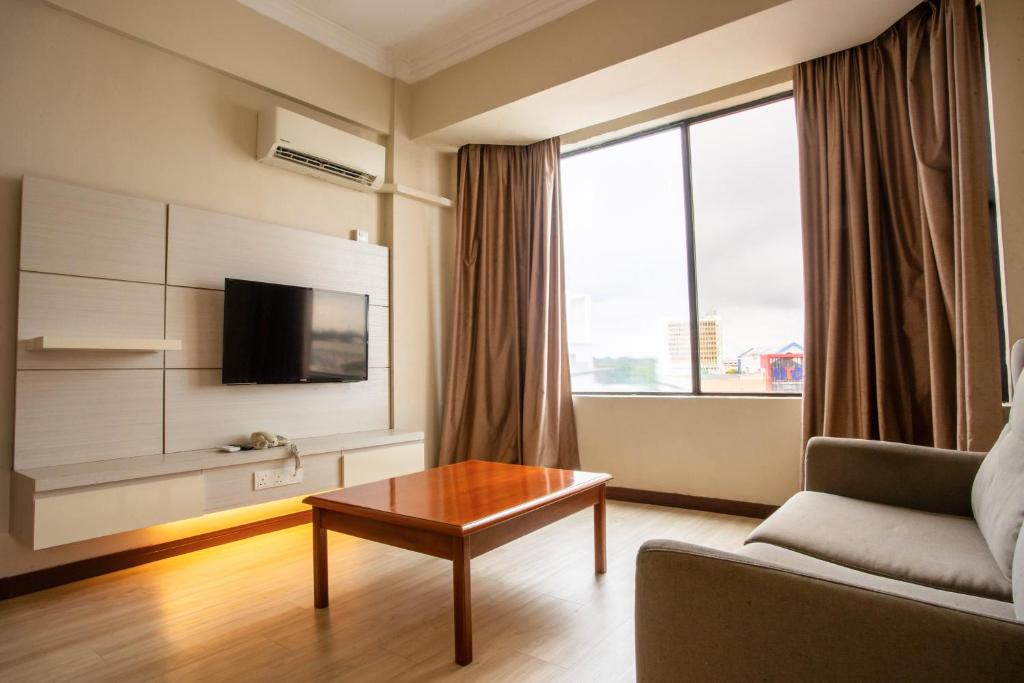 TV a/nebo společenská místnost v ubytování Somerset Hotel