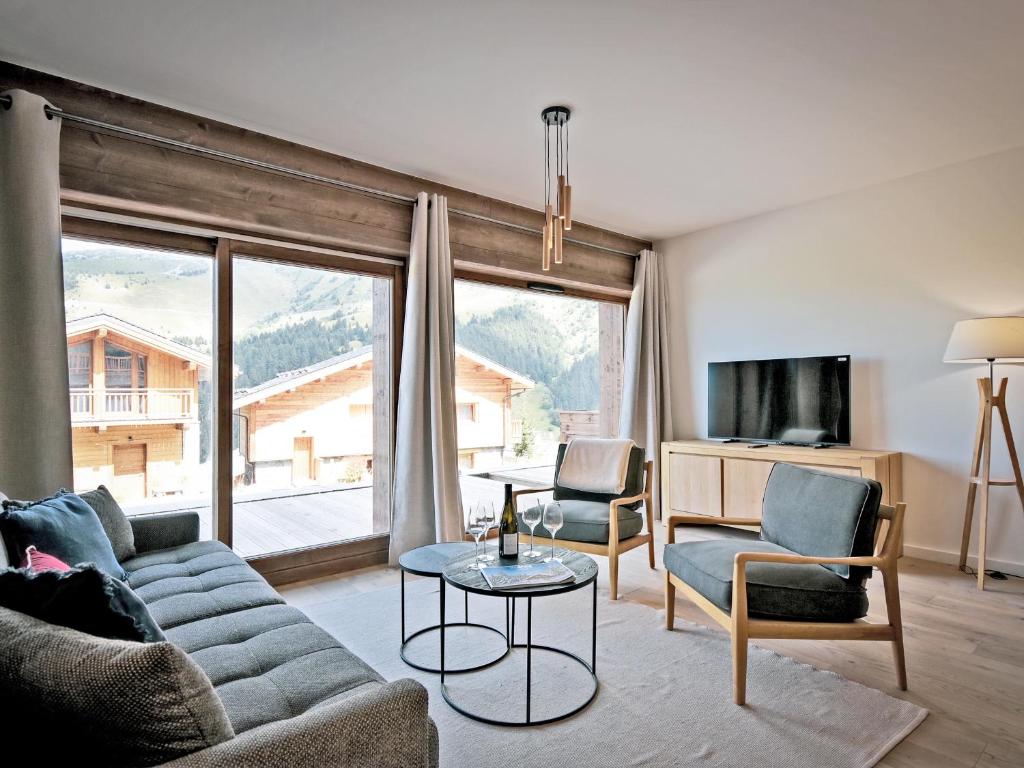 Spacieux appartement avec terrasse à 2 min des pistes, parking couvert et conciergerie - FR-1-613-98