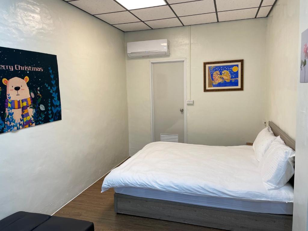 Postel nebo postele na pokoji v ubytování 佳林居