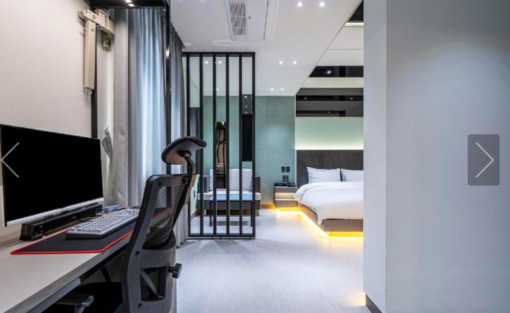 Postel nebo postele na pokoji v ubytování Reina Hotel