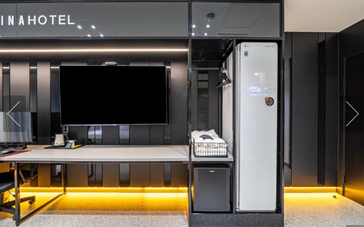 Kuchyň nebo kuchyňský kout v ubytování Reina Hotel