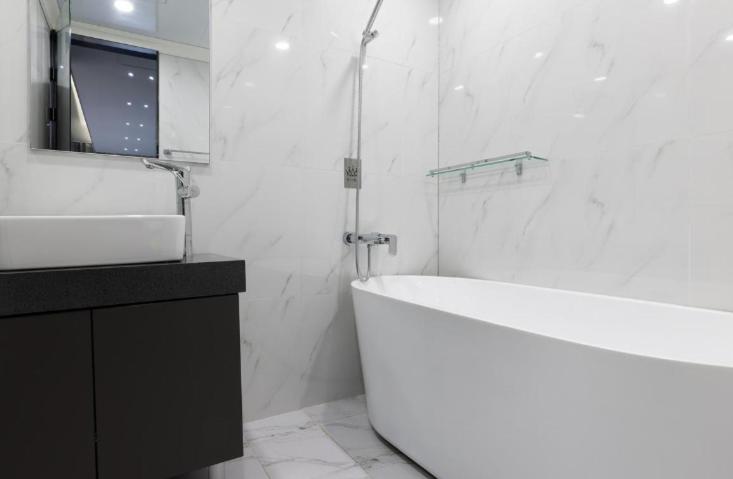 Koupelna v ubytování Reina Hotel
