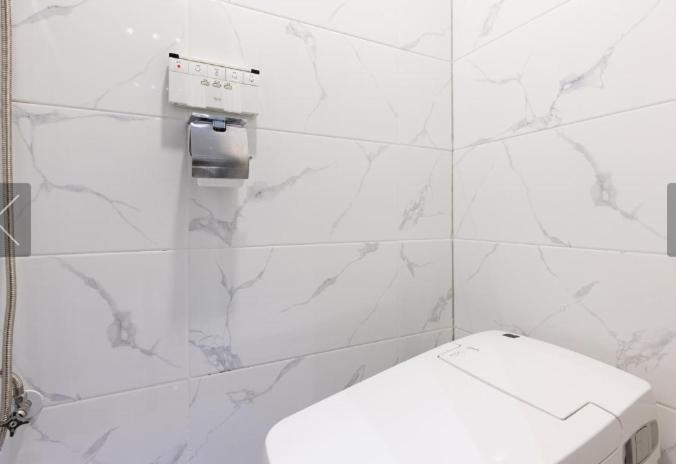 Koupelna v ubytování Reina Hotel