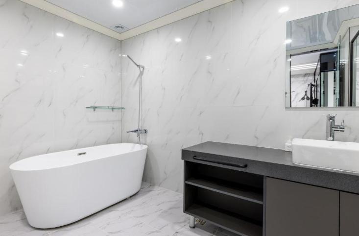 Koupelna v ubytování Reina Hotel