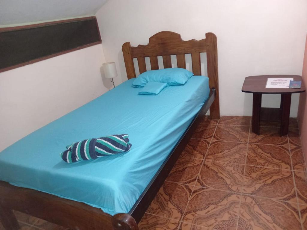 Postel nebo postele na pokoji v ubytování Nambí Rooms