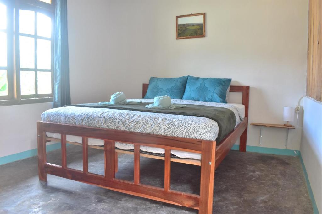 Postel nebo postele na pokoji v ubytování Mama's Homestay Ruteng