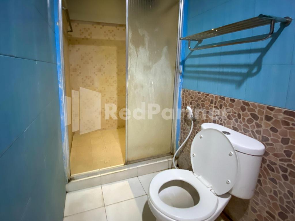 Koupelna v ubytování Istana Griya 2 Hotel Solo RedPartner