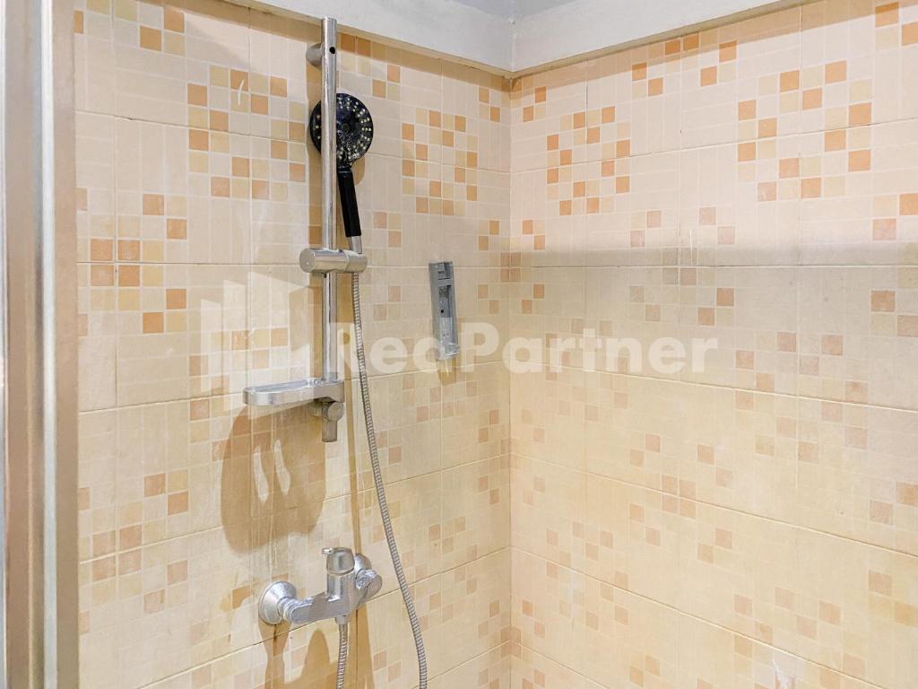 Koupelna v ubytování Istana Griya 2 Hotel Solo RedPartner