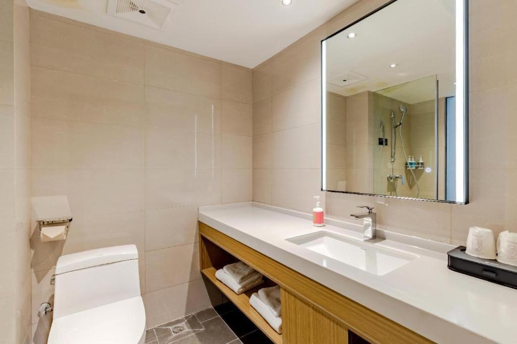 Ένα μπάνιο στο City Comfort Inn Shaorao Poyang