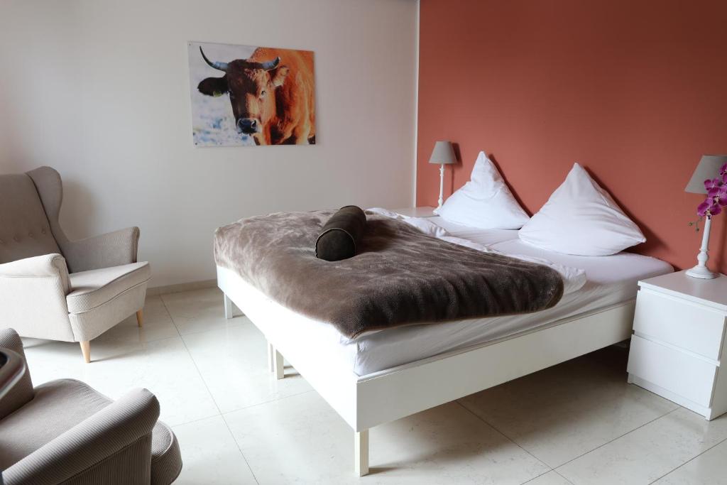 Postel nebo postele na pokoji v ubytování Residence