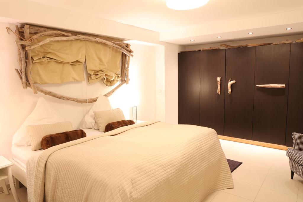 Postel nebo postele na pokoji v ubytování Residence