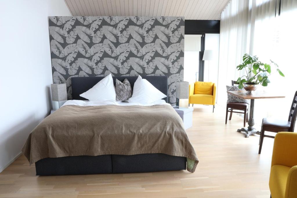 Postel nebo postele na pokoji v ubytování Residence