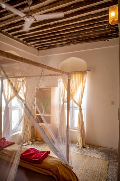 Postel nebo postele na pokoji v ubytování Firefly Boutique Lodge