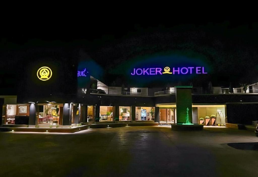 a joker and hotel at night at Joker Hotel and Suites in Benin City