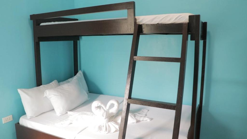 Postel nebo postele na pokoji v ubytování L&L Beach Resort