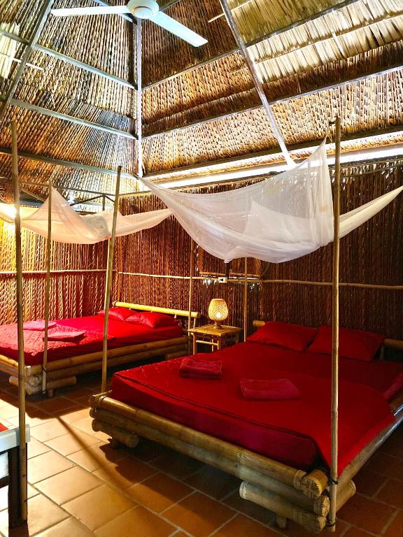 Postel nebo postele na pokoji v ubytování Hometravel Mekong Can Tho