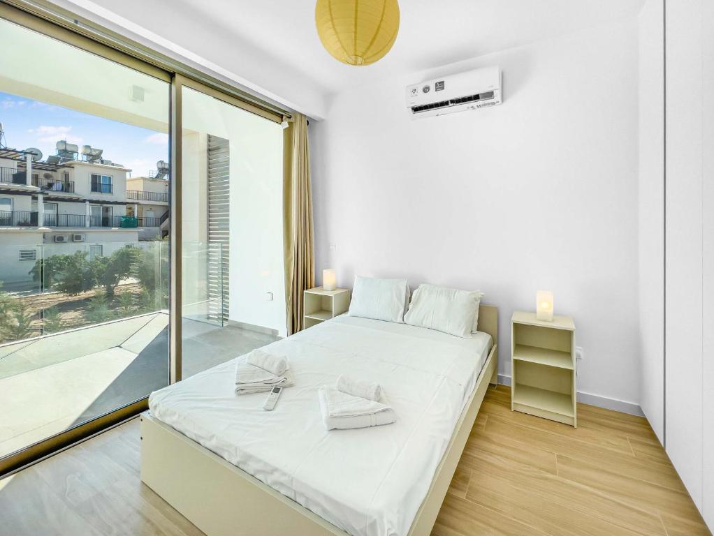 Postel nebo postele na pokoji v ubytování Azure Seaview - Garnet Villa